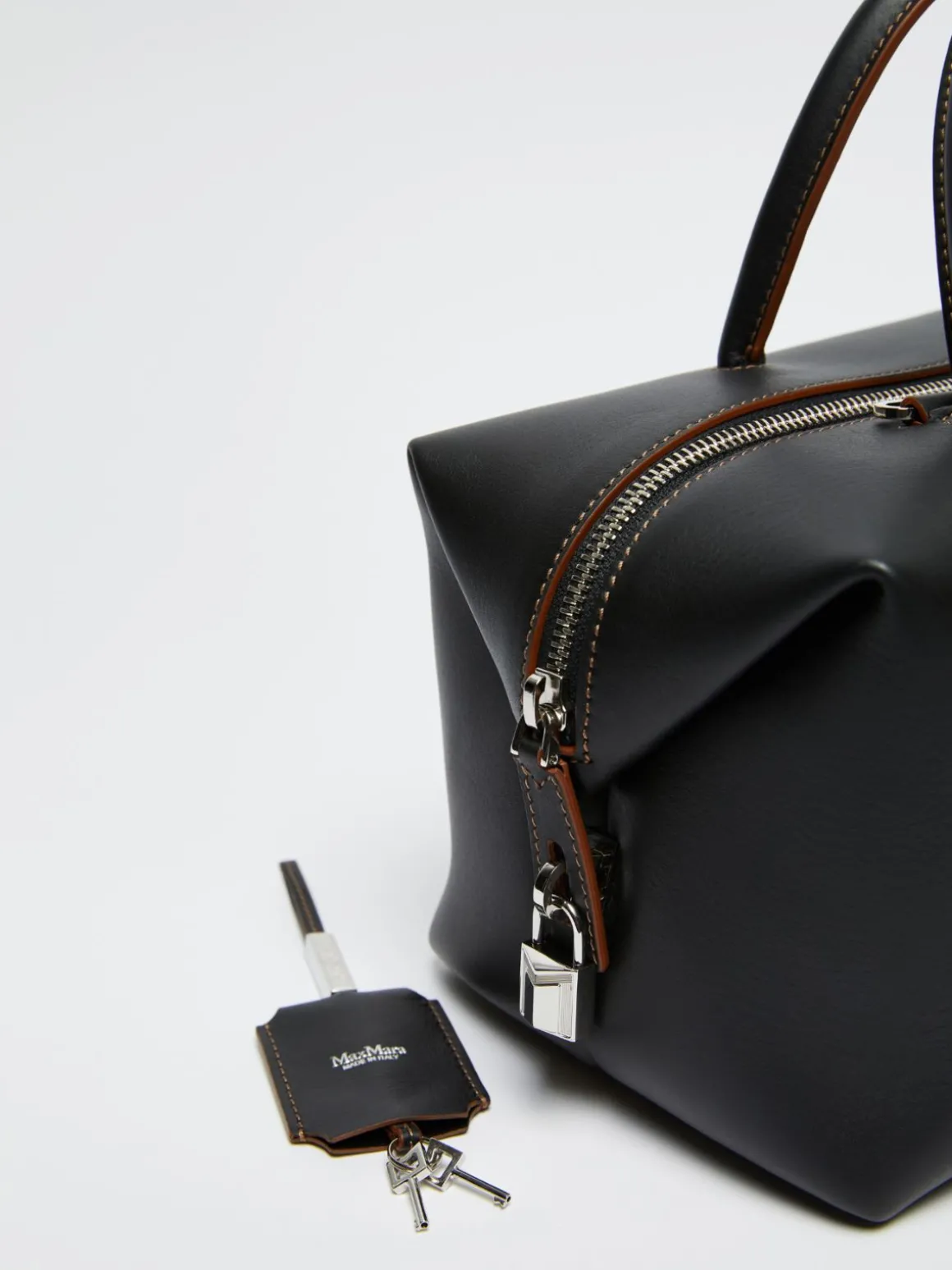 Bauletto in pelle lucida