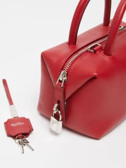 Bauletto piccolo in pelle naturale