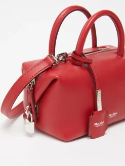 Bauletto piccolo in pelle naturale