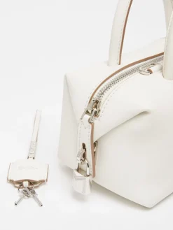 Bauletto piccolo in pelle con tasca suede