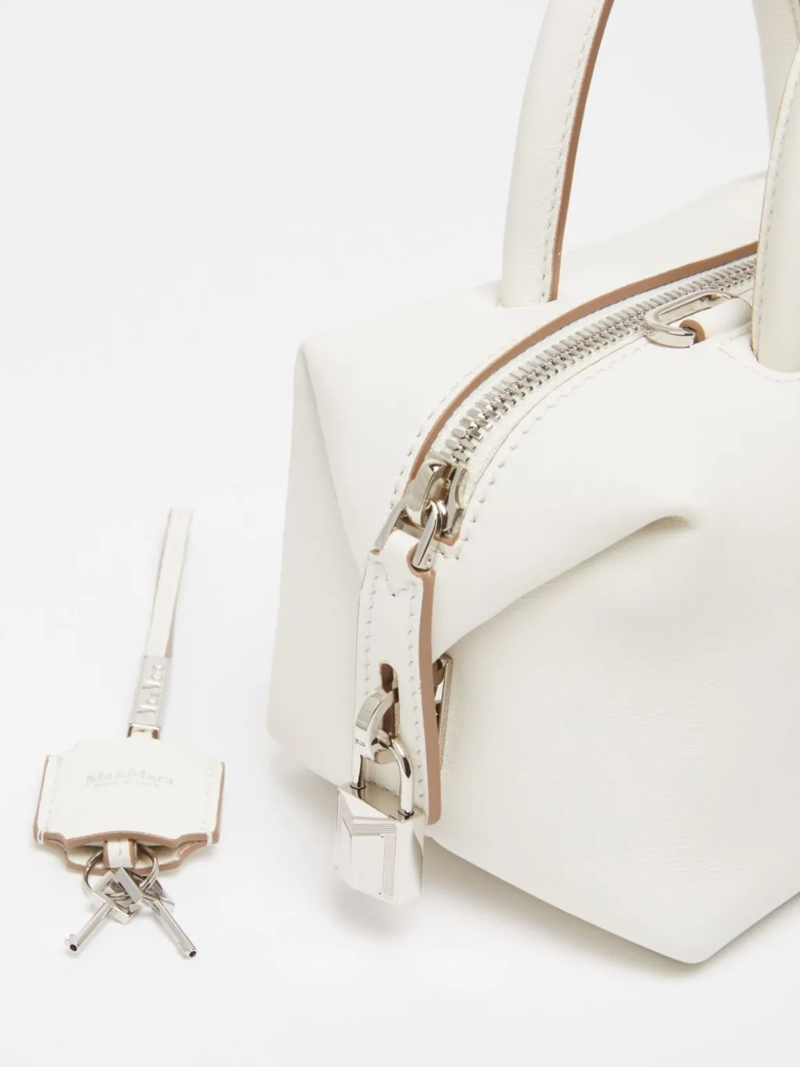Bauletto piccolo in pelle con tasca suede