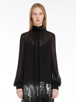 Blusa dolcevita in georgette