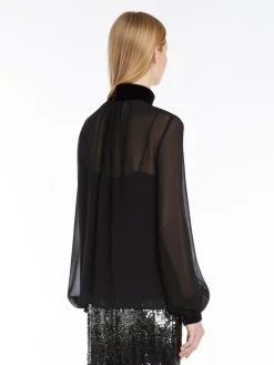 Blusa dolcevita in georgette