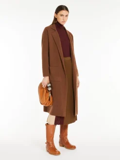 Cardigan in maglia di lana a coste