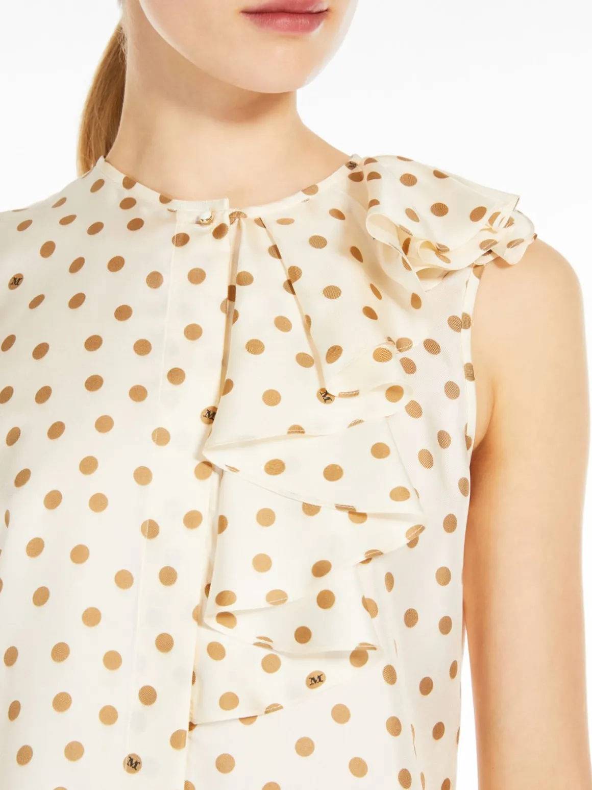Top con rouches in seta stampata